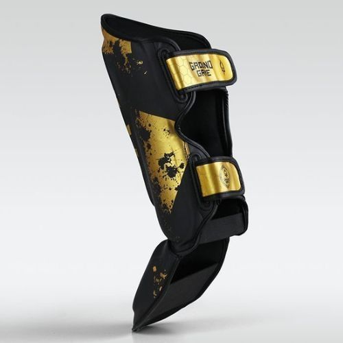 Ground Game Cage Gold blauzdikaulių apsaugos juoda SHINGUCGOLDS