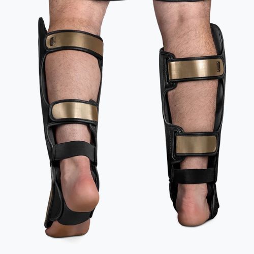 Hayabusa T3 Striking Shin Guards juodos/auksinės spalvos T3SSG blauzdikaulių apsaugos