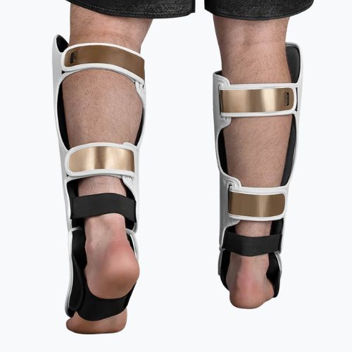 Hayabusa T3 Striking Shin Guards baltos ir auksinės spalvos T3SSG blauzdikaulių apsaugos