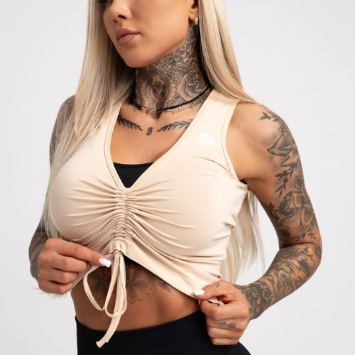 Moterų treniruočių viršutinė dalis Gym Glamour Pull-on Beige 448