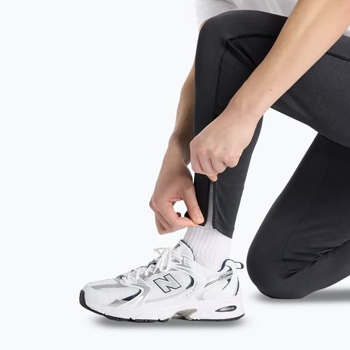 Vyriškos bėgimo kelnės New Balance Sport Knit juodos spalvos