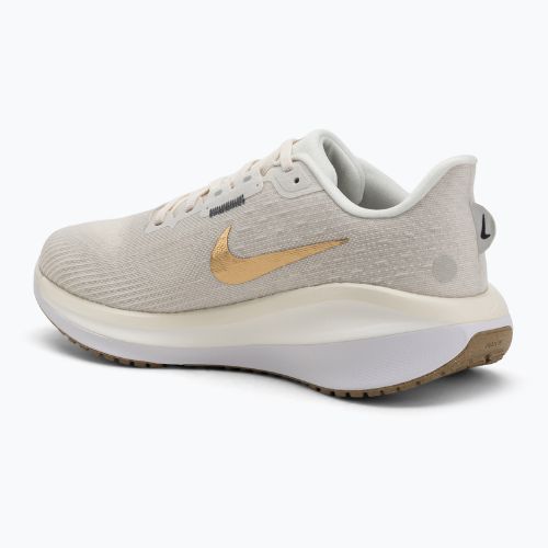 Moteriški bėgimo bateliai Nike Vomero 17 phantom/light bone/sail/metallic gold