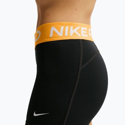 Moteriški šortai Nike Pro Mid-Rise Biker 3" black/university gold/white