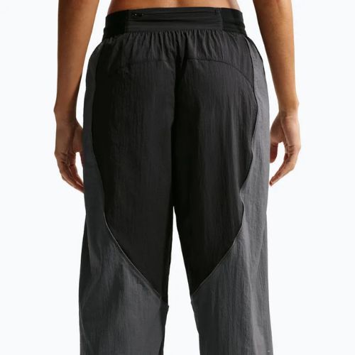 Moteriškos bėgimo kelnės Nike Swift UV Repel Mid-Rise black/iron grey