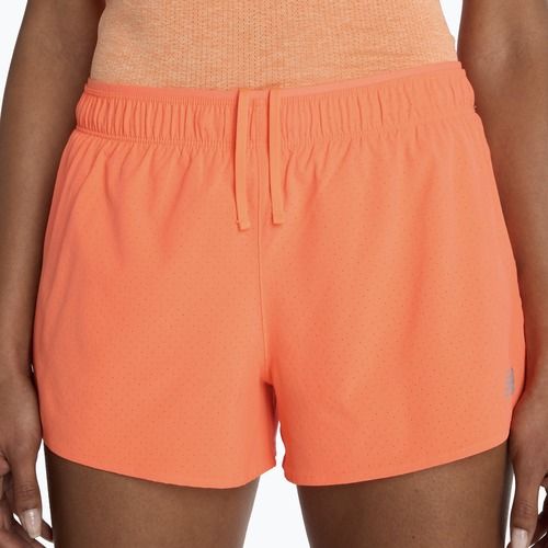 Moteriški šortai New Balance RC Seamless 3" tangerine heat