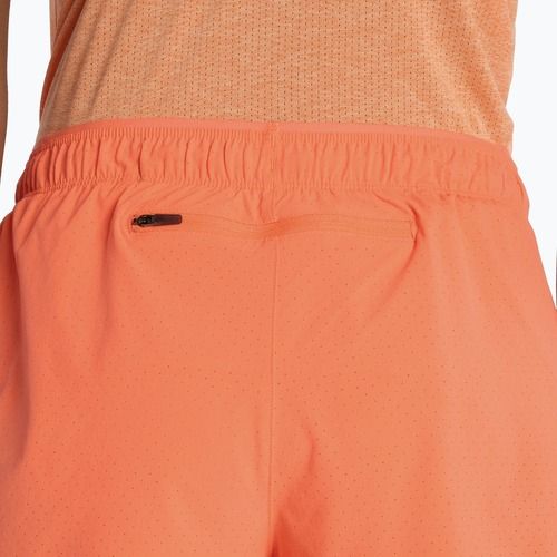 Moteriški šortai New Balance RC Seamless 3" tangerine heat