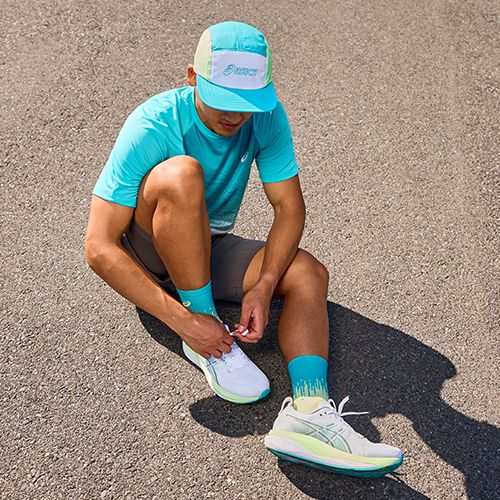 Vyriški bėgimo batai ASICS Gel-Kayano 33 white/stadium orange