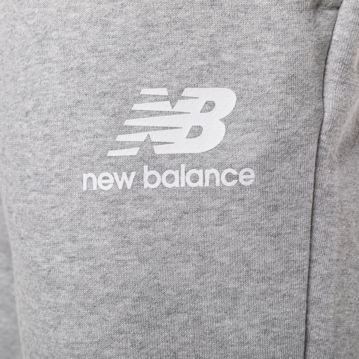 Moteriškos treniruočių kelnės New Balance Essentials Stacked Logo French grey WP31530AG 7