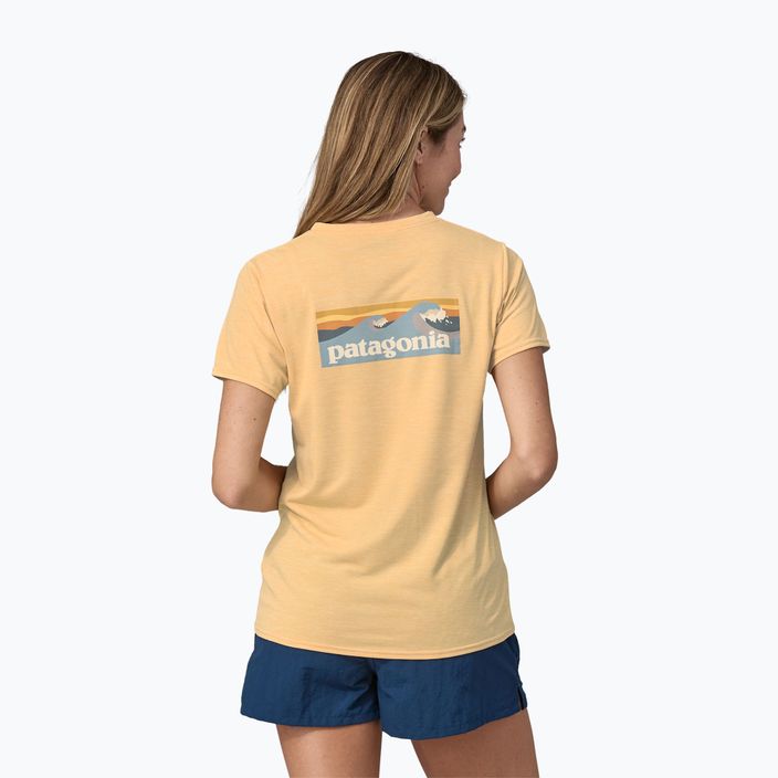 Moteriški Patagonia Cap Cool Daily marškinėliai su grafiniais piešiniais Waters boardshort logo/sandy melon x-dye 2