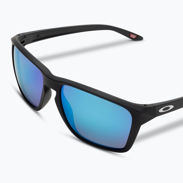 "Oakley Sylas" matinės juodos/prizm safyro spalvos poliarizuoti akiniai nuo saulės 5