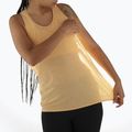 Moteriškas bėgimo tank topas Salomon SHAKEout Air Tank warm apricot 3