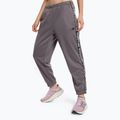 Moteriškos treniruočių kelnės New Balance Relentless Performance Fleece pilka WP13176ZNC