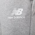 Moteriškos treniruočių kelnės New Balance Essentials Stacked Logo French grey WP31530AG 7