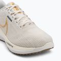 Moteriški bėgimo bateliai Nike Vomero 17 phantom/light bone/sail/metallic gold 7