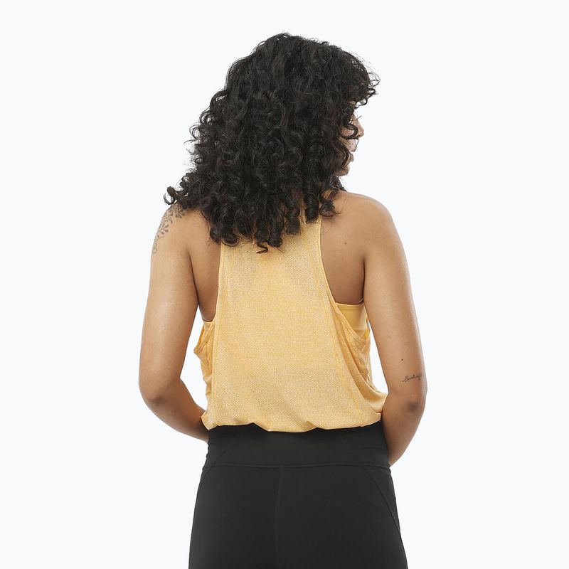 Moteriškas bėgimo tank topas Salomon SHAKEout Air Tank warm apricot 2