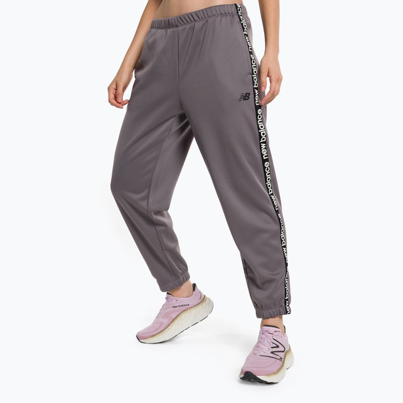 Moteriškos treniruočių kelnės New Balance Relentless Performance Fleece pilka WP13176ZNC