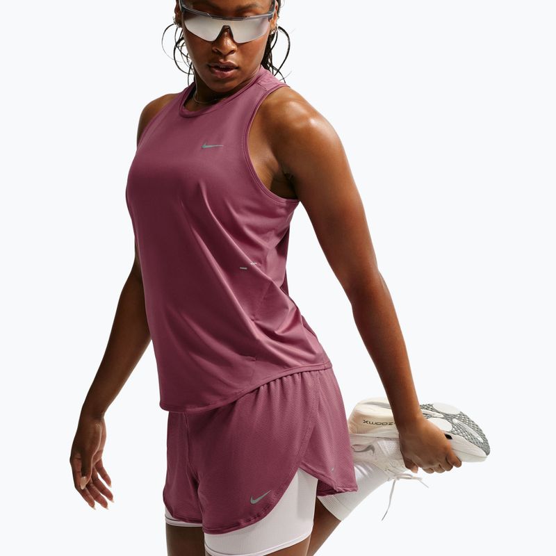 Moteriški bėgimo šortai Nike Flow pink smoke 6
