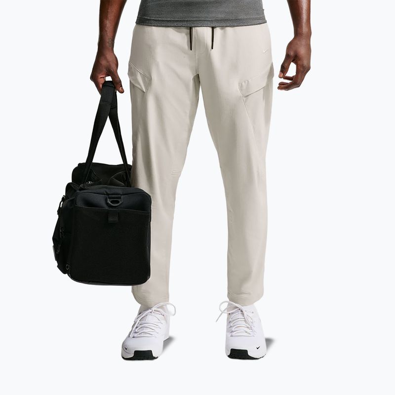 Vyriškos kelnės Nike Unlimited ight orewood brown/black/light orewood brown 7