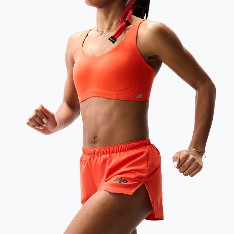 Moteriški bėgimo šortai New Balance Run Essentials 3" Short neo flame 3