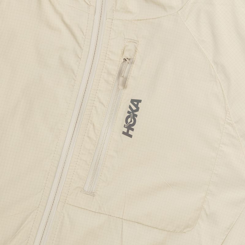 Moteriška bėgimo striukė HOKA Skyflow Wind Jacket oat milk 3