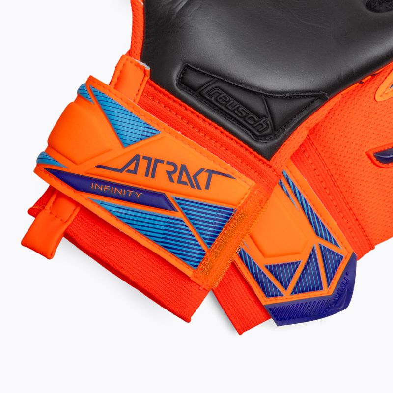 Vaikiškos vartininko pirštinės Reusch Attrakt Infinity Evolution NC Junior shocking orange/blue/black 5