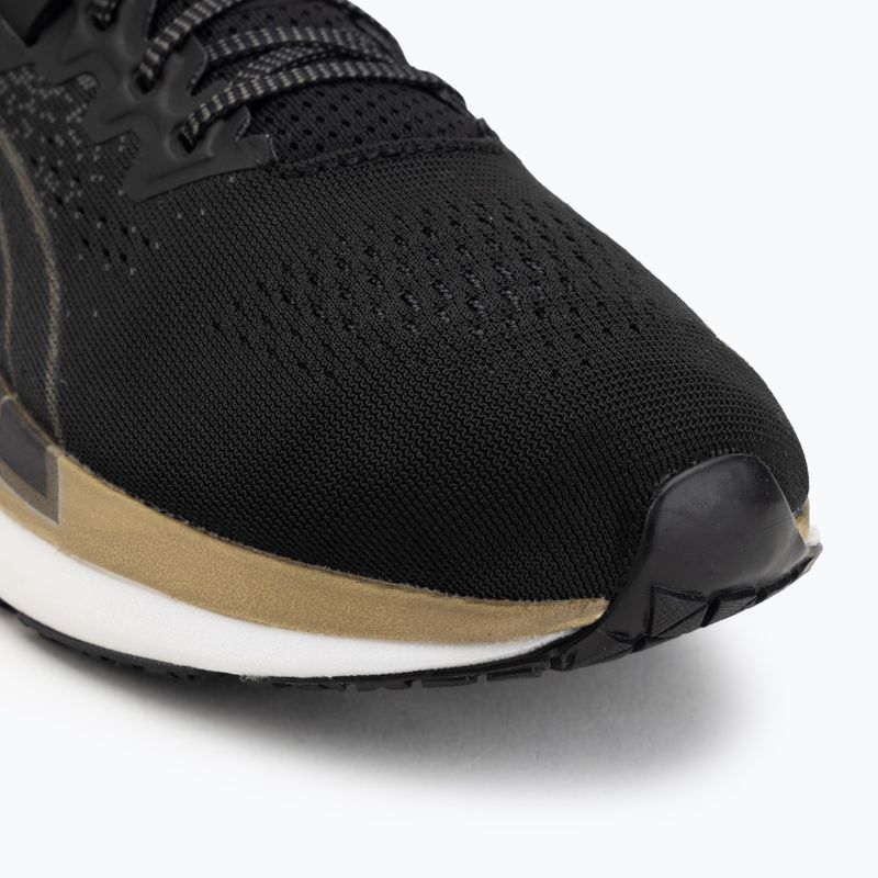 Moteriški bėgimo batai Puma Eternity Nitro black/gold/white 7