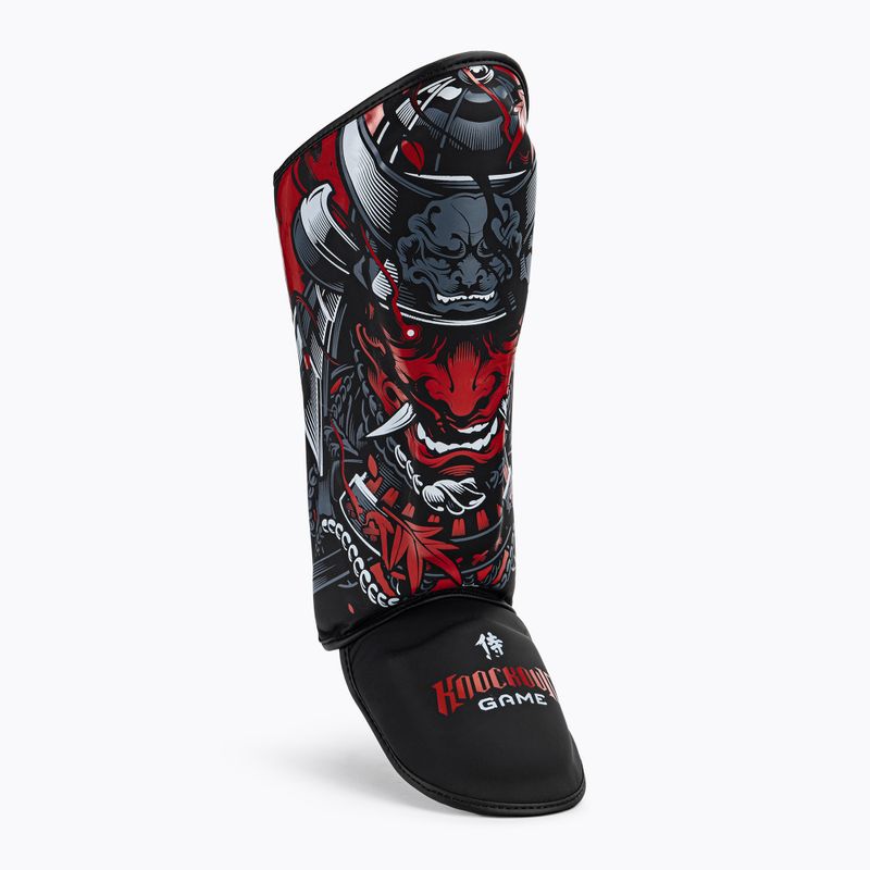 Ground Game Samurai blauzdikaulių apsaugos juodos ir raudonos spalvos