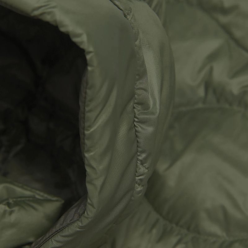 Moteriškas pūstas paltas Peak Performance Helium Down Coat pine needle/olive extreme 10
