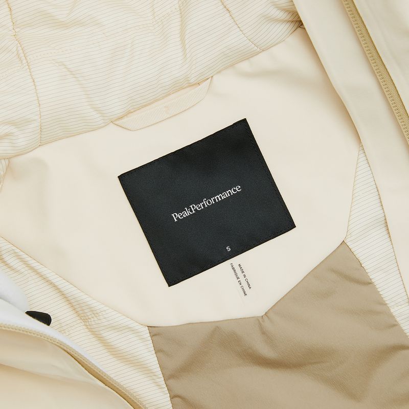Moteriška slidinėjimo striukė Peak Performance Whitelight APX sand fog 4