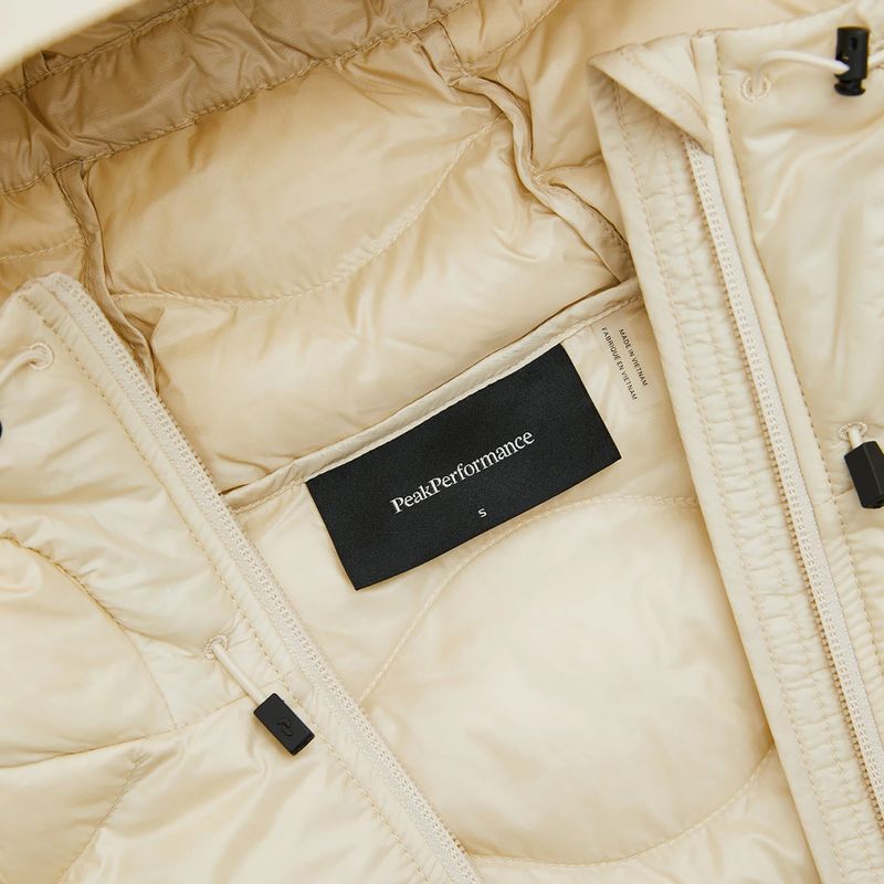 Moteriškas pūstas paltas Peak Performance Helium Down sand fog 9