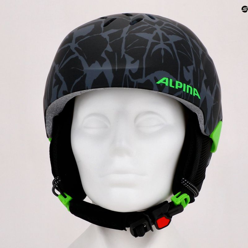 Alpina Pizi vaikiškas slidinėjimo šalmas juodas/žalias kamufliažas matinis 15
