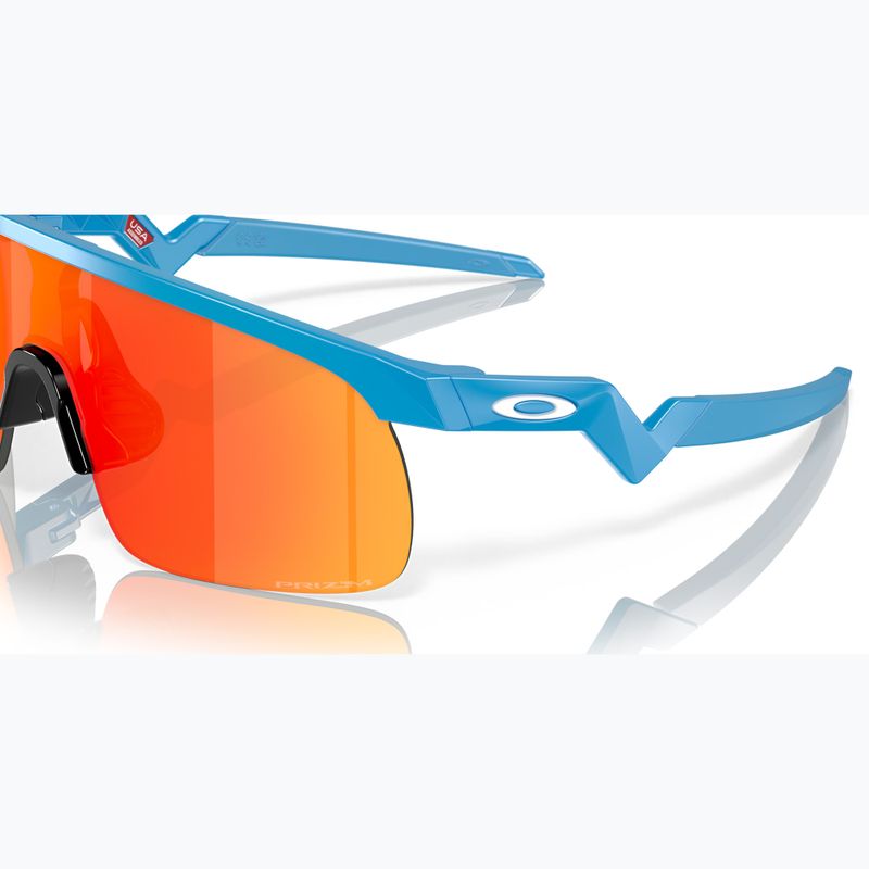 Vaikiški akiniai nuo saulės Oakley Resistor sky blue/prizm ruby 7