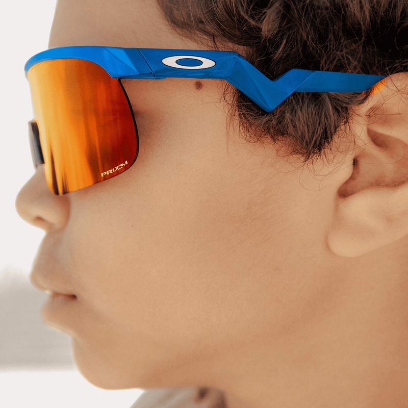 Vaikiški akiniai nuo saulės Oakley Resistor sky blue/prizm ruby 10
